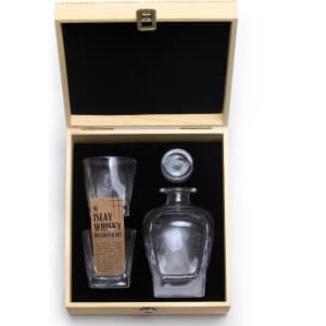 A glass decanter set featuring a clear decanter and two matching glasses, presented in a wooden box with a black interior.