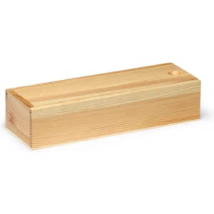 A wooden box with a smooth finish, featuring a small hole on one side. The wood is light in colour.