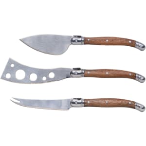 A set of three stainless steel cheese knives with wooden handles, featuring a pointed, spreading, and slicing knife.