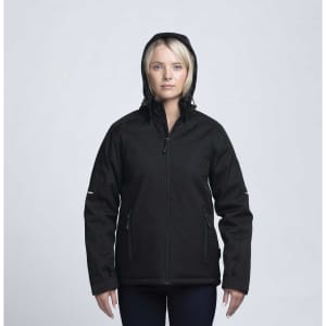 A black soft shell jacket with a hood, featuring zippers and pockets, modelled by a woman.