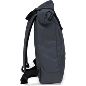 A dark grey roll-top backpack with adjustable straps and a smooth texture on the side.