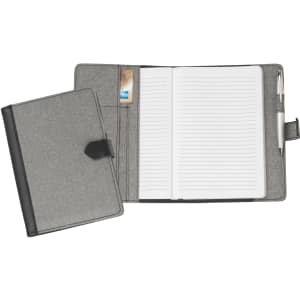 A grey Trekk Journal Book with a pen, card slot, and lined pages inside. It features a sleek, modern design.