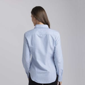 A blue women's button-up shirt with a fitted design, featuring a collar and long sleeves.