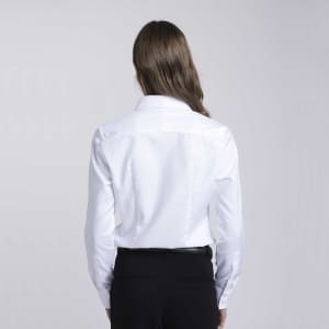 A button-up shirt in white, featuring a tailored design and long sleeves, with a visible logo on the back.