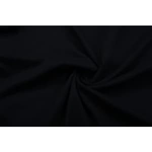 A black cotton T-shirt fabric twisted in a spiral pattern. The material appears smooth and flexible.