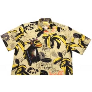 A short-sleeve shirt featuring a playful banana and monkey print in yellow and black tones on a beige background.