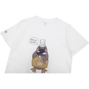 A white cotton t-shirt featuring a graphic of a platypus chef with a speech bubble. It has a logo on the sleeve.