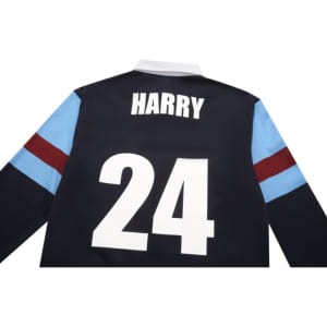 A black sports jumper featuring blue and maroon sleeves, with a large white number 24 and the name Harry.