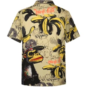A short-sleeve shirt featuring a yellow pattern with bananas and a monkey graphic, adorned with various artistic elements.