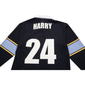 A black sports jumper featuring a white number "24" and a name on the back, with blue and yellow stripes on the sleeves.