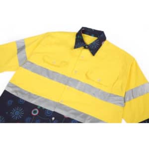A bright yellow cotton Hawaiian shirt with reflective stripes and a patterned navy bottom section, featuring a logo.