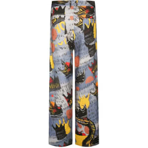 A pair of wide-legged pants featuring a vibrant multicoloured print with abstract designs and a variety of graphics.