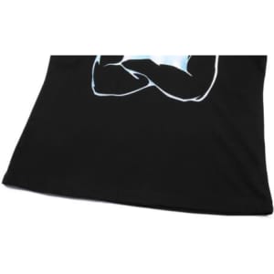 A black cotton t-shirt featuring a printed design with a logo on it, showcasing a close-up view of the fabric.
