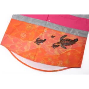 A Hawaiian shirt featuring vibrant orange fabric with turtle designs, complemented by a pink and grey collar.