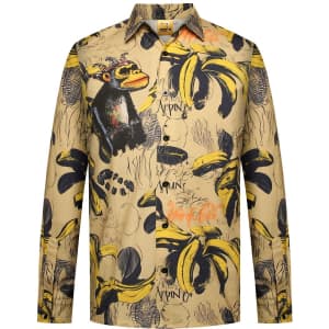 A long-sleeve shirt featuring a vibrant design with yellow bananas and a monkey illustration on a beige background.