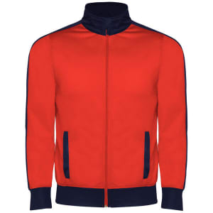 A red tracksuit jacket with navy accents, featuring a zip front and two side pockets. Includes a logo.