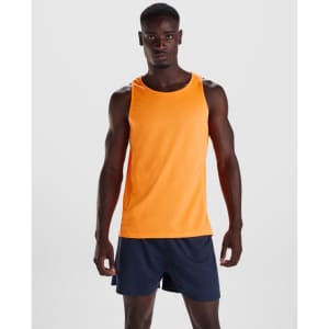 An orange Andre tank top displayed on a model, paired with navy shorts. The tank has a brand logo.