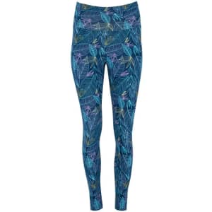 Colourful blue leggings featuring a tropical leaf pattern with various shades of green and purple. Includes a branding logo.