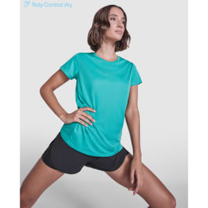 A turquoise women's T-shirt with a sleek design, paired with black shorts, featuring a logo on the shirt.