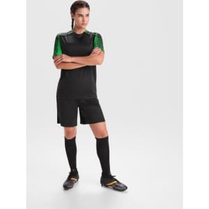 A black sports uniform featuring green accents, with a short-sleeved top, shorts, and knee-length socks.