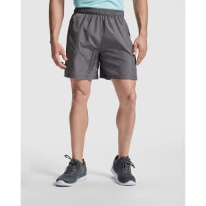 Celtic shorts in dark grey, featuring an elastic waistband and a logo on the side. Ideal for sports and outdoor activities.