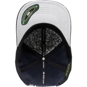 A navy blue six-panel cap with a grey peak and an interior featuring a detailed pattern and a logo.