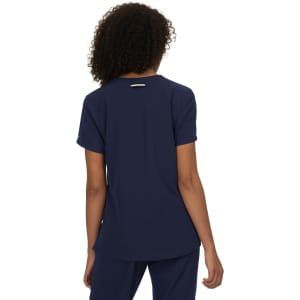 A navy blue top featuring a simple design and a small logo on the back.