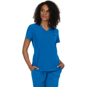 A blue top with a v-neckline and a small pocket, modelled by a woman with curly hair. It has a logo.