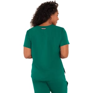 A green top with short sleeves, featuring a back design and a logo.