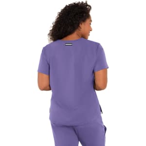 A purple top with a logo, featuring short sleeves and a back view of a woman wearing it.