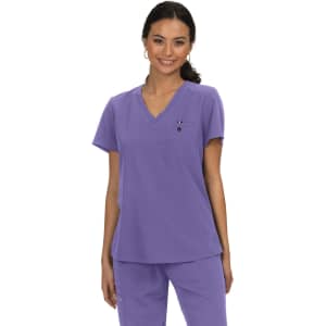 A purple short-sleeved top with a V-neck design and a logo, displayed on a model.