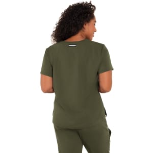 A woman wearing a dark olive green top, showcasing the back view with short sleeves and a casual design.