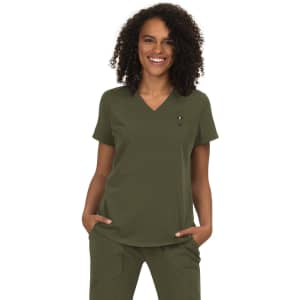 A model wearing an olive green scrub top with a V-neckline and a small logo on the chest.
