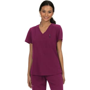 A purple medical top with a v-neck, short sleeves, and a small logo on the chest.