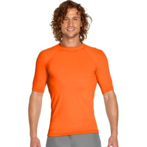An orange adult short sleeve rashie with a fitted design and a logo on the chest.