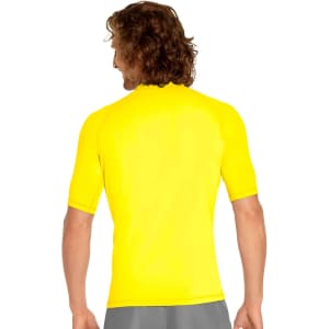 A yellow adult short sleeve rashie with UPF 50+, featuring a fitted design and a logo on the back.