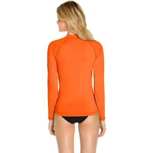 An orange long sleeve rashie with a fitted design, featuring a high collar and a plain back.