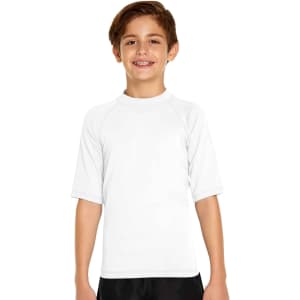 A young boy in a short sleeve white rashie, featuring a logo, designed for sun protection with UPF 50+.
