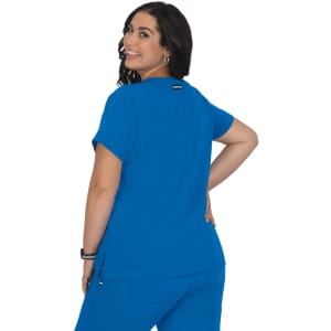 A blue top featuring short sleeves and a relaxed fit, designed for comfort. The back displays a subtle logo.