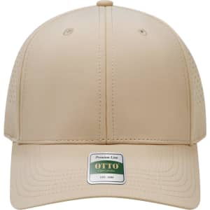 A beige perforated cap with a structured six-panel design and a branded tag at the front.