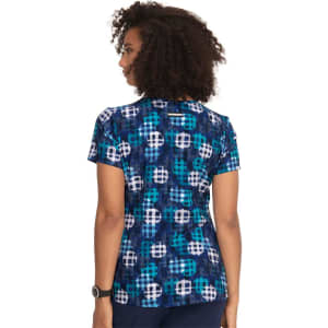 A patterned top featuring blue, white, and teal designs. The back view shows short sleeves and a round neckline.