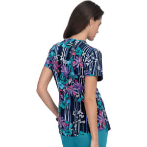 A floral print top in navy blue with pink, purple, and teal accents, featuring short sleeves and a relaxed fit.