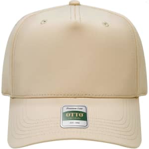 A beige five-panel cap with a branded label on the front and ventilation holes.