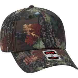 A 6 panel baseball cap in camo pattern featuring shades of green, brown, and touches of orange leaves. It has a logo.
