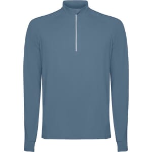 A half zip sweatshirt in a muted blue colour, featuring long sleeves and a white zip detail at the neck.