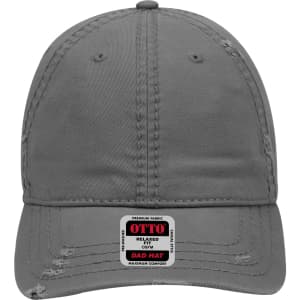 A grey 6 panel low profile dad cap with a distressed finish and a logo on the front.