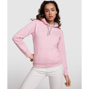 A pink hooded sweatshirt featuring a front pocket and a contrasting hood. It has a logo on the chest.