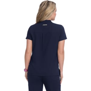 A navy blue top with a collar and short sleeves, featuring a logo on the back.