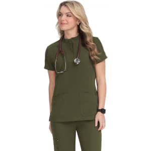 A woman wearing a short-sleeved, olive green medical scrub top, with a stethoscope around her neck.