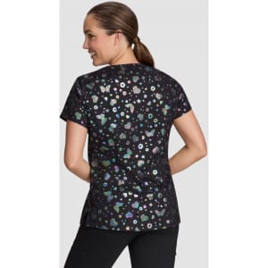 A black top featuring a colourful print of flowers and stars, with a round neckline and short sleeves.